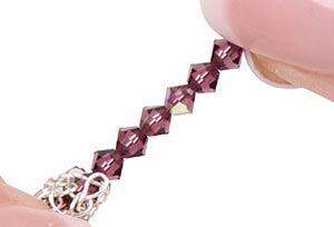 Crystal beads stringing onto wire
